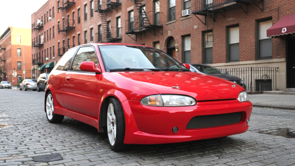 Mitsubishi Colt red colour