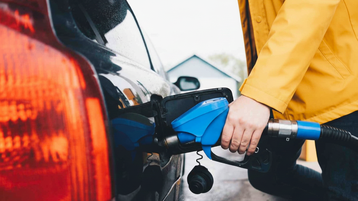 putting fuel in a car